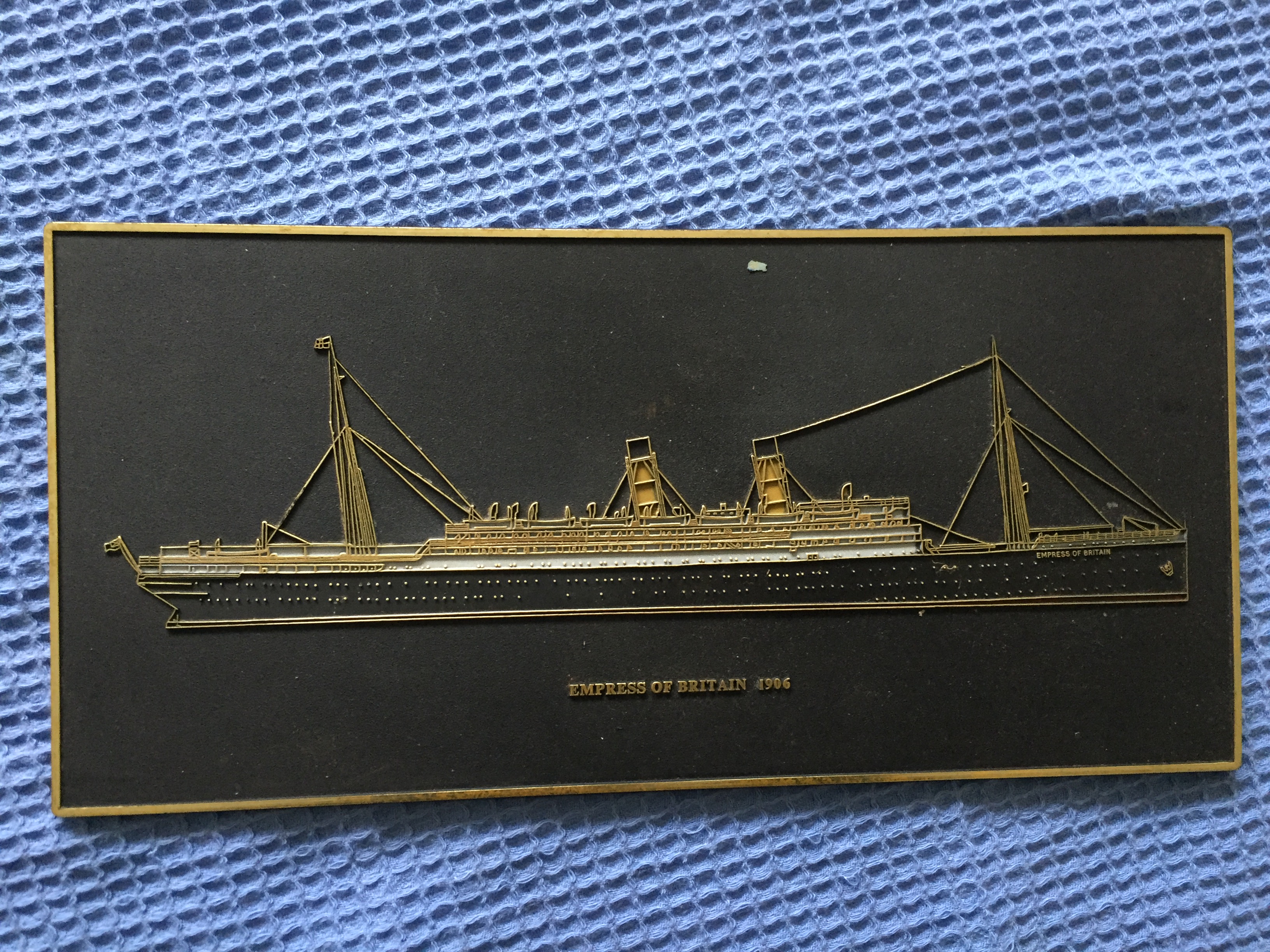 AN OLD ORIGINAL WALL PAQUE OF THE CANADIAN PACIFIC LINE VESSEL THE EMPRESS OF BRITAIN